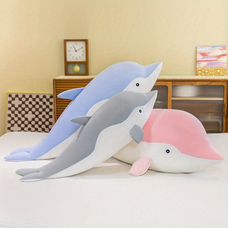 Soft polyester plush dolphin toy for nursery in pastel colors.