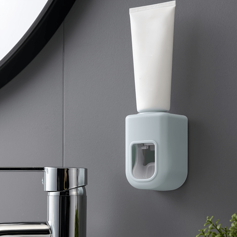 Automatic toothpaste dispenser for wall mounting. Simplifies toothpaste usage in the bathroom.