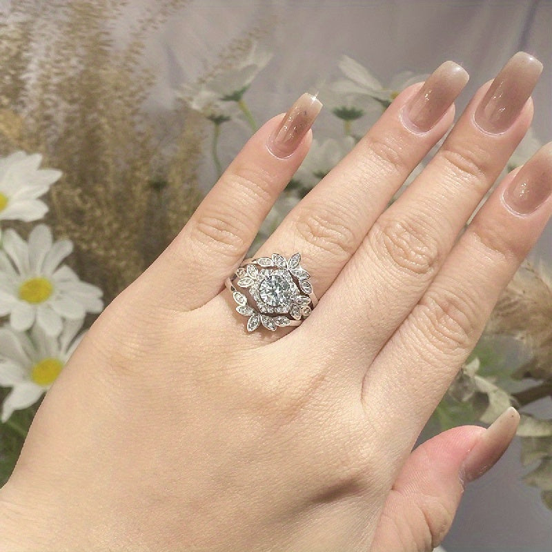 Moissanite Stacking Rings featuring a sparkling flower design in 925 Sterling Silver. This high quality engagement/wedding ring is the perfect gift for her, complete with certificate and gift box.