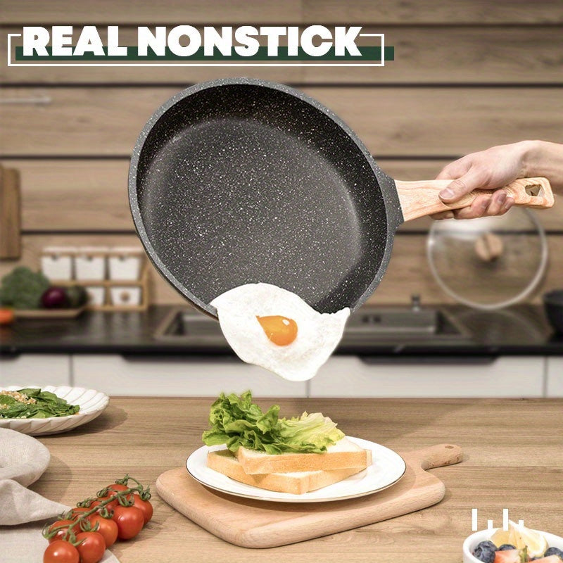 Non-stick frying pan with lid, perfect for cooking beef patties, sesame fry bag, chicken willow, and chicken wing on any stove. Essential kitchenware for all your cooking needs.