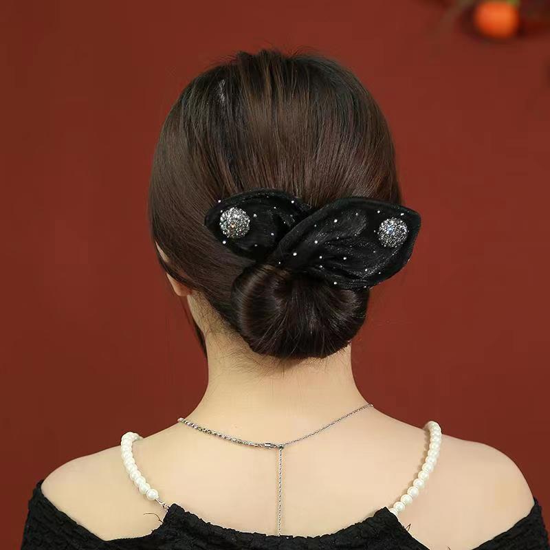 Black bow hair clip with sparkling embellishments - stylish accessory for women, ideal for Valentine's Day parties