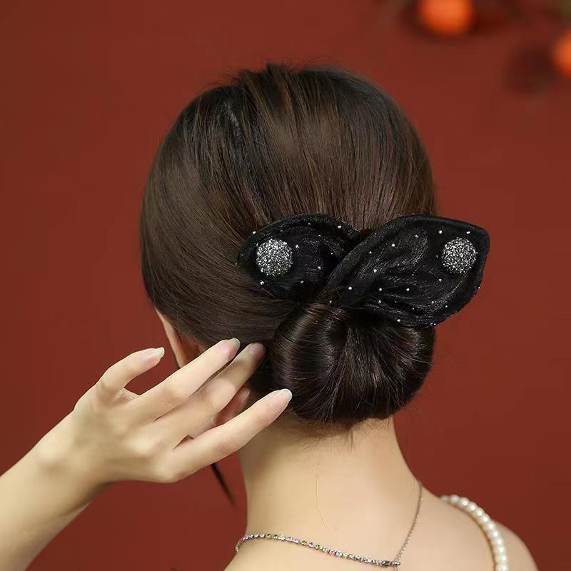 Black bow hair clip with sparkling embellishments - stylish accessory for women, ideal for Valentine's Day parties