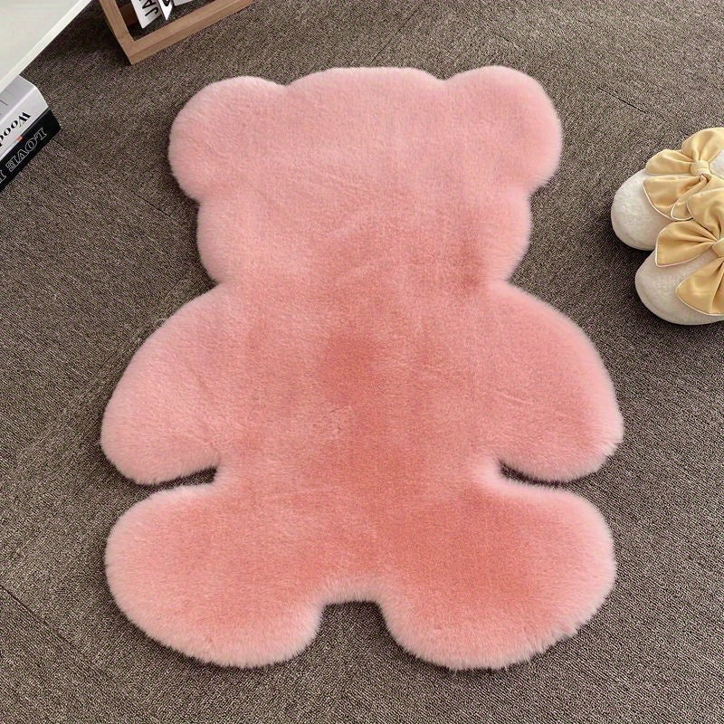 Bear-shaped area rug, featuring a cute animal pattern and fluffy cushioning, designed for softness and comfort. This soft furry throw carpet doubles as an anti-fatigue floor mat, perfect for use in high traffic areas. Ideal for adding a touch of spring