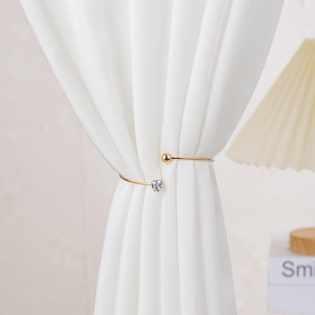 Decorate your home with this elegant Copper Alloy Curtain Holdback featuring Ball & Cubic Zirconia decor. Perfect for adding a touch of glamour to your living room or bedroom, this decorative accessory is sure to enhance any curtain.