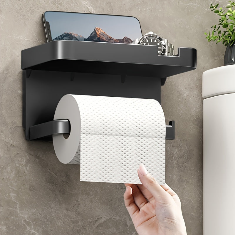 Toilet paper holder in black plastic with drawer, can be wall-mounted. Versatile organizer for bathroom and kitchen, doubles as storage rack. Does not require electricity. Ideal for hotels and includes bathroom accessories.