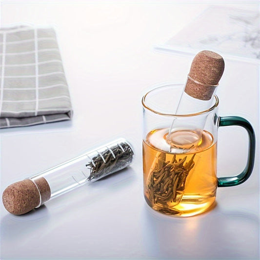 Heat resistant glass tea strainer with transparent steeper tube for loose leaf tea - perfect for home and office use! Sustainable and reusable tea accessory.