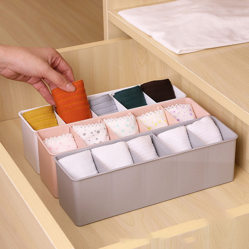 Multi-functional drawer organizer designed for organizing socks, panties, and accessories - Made of sturdy plastic with various compartments to store belts, ties, bras, and other items - Ideal for dorm rooms and bedrooms.