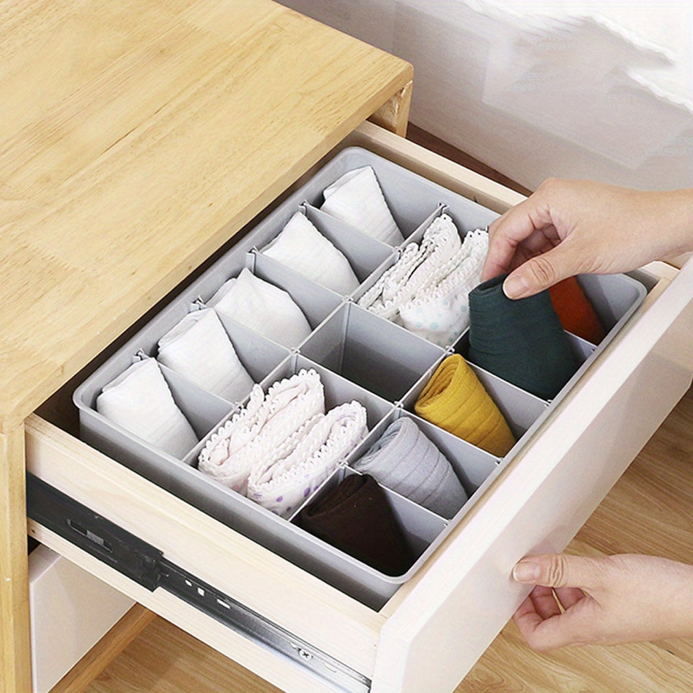 Multi-functional drawer organizer designed for organizing socks, panties, and accessories - Made of sturdy plastic with various compartments to store belts, ties, bras, and other items - Ideal for dorm rooms and bedrooms.