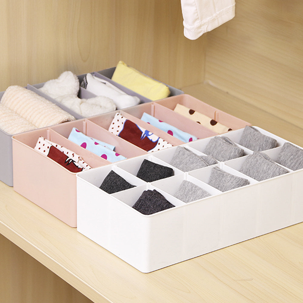 Multi-functional drawer organizer designed for organizing socks, panties, and accessories - Made of sturdy plastic with various compartments to store belts, ties, bras, and other items - Ideal for dorm rooms and bedrooms.