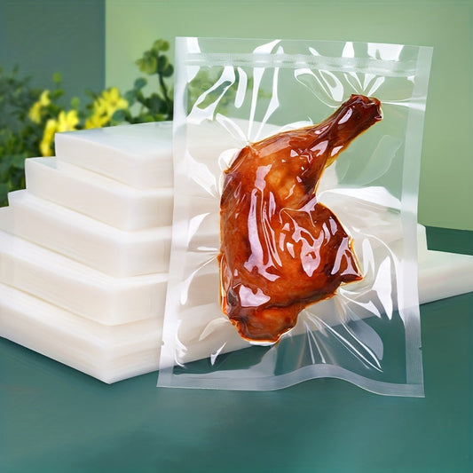 100 pieces of textured vacuum sealer bags for food packaging, household transparent airtight bags for grains, meats, fruits, and vegetables. Ideal for kitchen organization and storage, as well as a useful kitchen accessory.