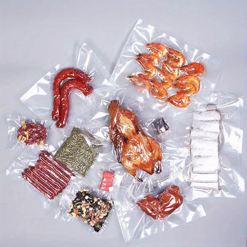 100 pieces of textured vacuum sealer bags for food packaging, household transparent airtight bags for grains, meats, fruits, and vegetables. Ideal for kitchen organization and storage, as well as a useful kitchen accessory.