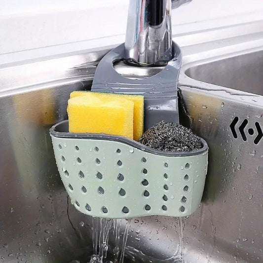 Adjustable Strap Sink Sponge Holder - Versatile Organizer for Kitchen & Bathroom, Features Easy-Drain Design, Ideal for Holding Brushes & Sponges, Made of Durable Plastic in Light Green Color, Perfect Sponge Rack for Kitchen Sink