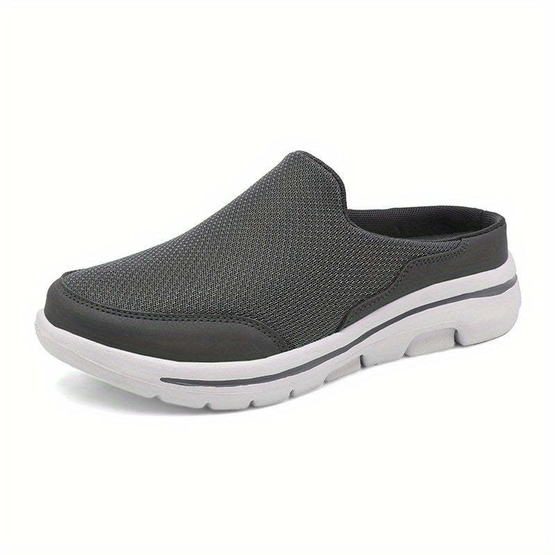 Breathable men's mules in black and white with cushioned insole for comfortable walking.