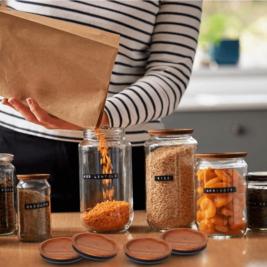 Pack of 12 Regular Mouth Wooden Storage Lids for Ball jars. Features a smooth surface and airtight silicone seal in brown color, designed to prevent hand damage.