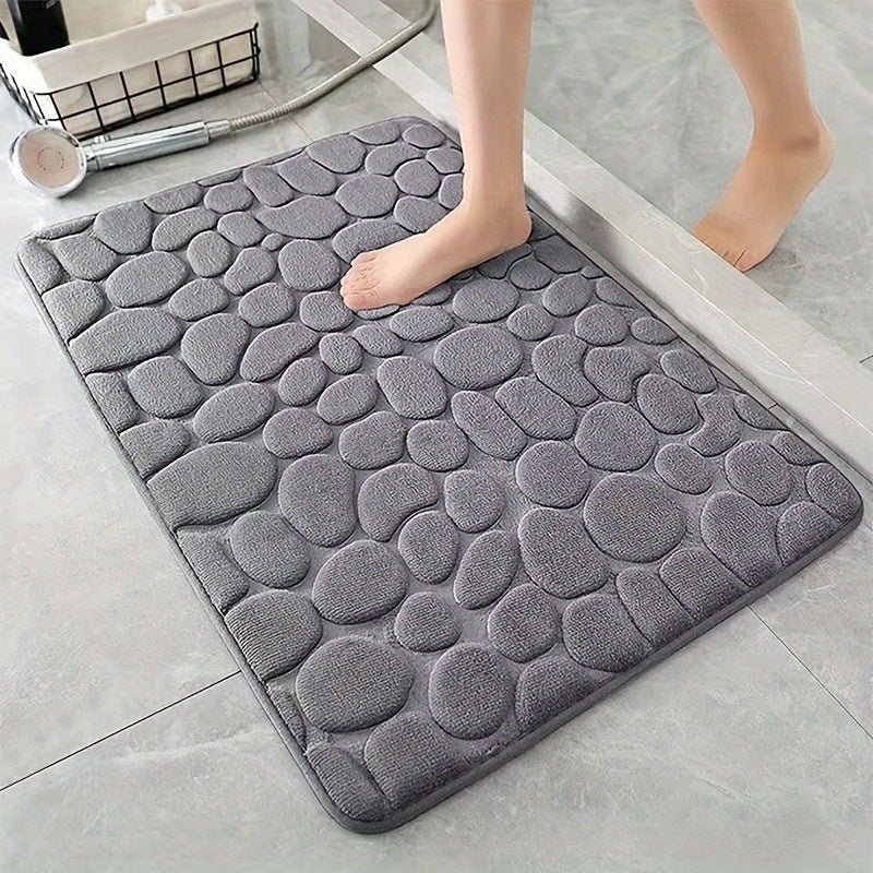 Soft and comfortable memory foam bath rug with cobblestone embossment, rapid water absorbent, washable, non-slip, perfect for shower room and bathroom accessories, spring decor.