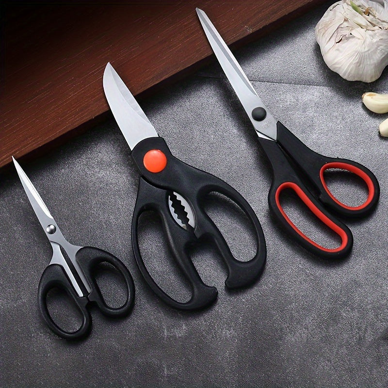 Set of 3 stainless steel kitchen shears for various uses including cutting chicken, meat, herbs, and tailoring. High-quality and versatile scissors.