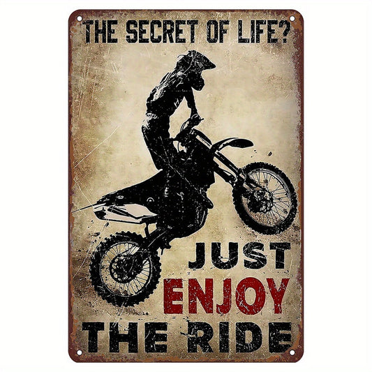 Metal tin sign: "The Secret of Life - Just Enjoy the Ride" - perfect gift for cycling enthusiasts! This funny wall art is ideal for interior decoration in a motorbike shop, living room, home bar, cafe, garage, kitchen, gym, boxing club, or fitness club.