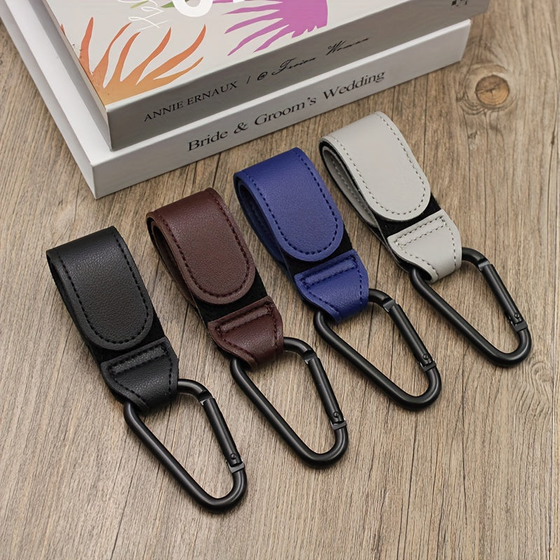 Set of 2 Stroller Hooks for Hanging Diaper Bags, Grocery Shopping Bags, or Pram Straps. The perfect multi-purpose gift for Christmas, Halloween, Thanksgiving, or any occasion. Made of high-quality faux leather.