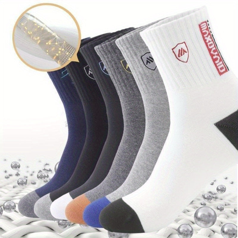 5 pairs of men's trendy color block crew socks, breathable and comfortable for outdoor wearing in all seasons.