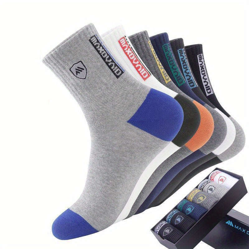 5 pairs of men's trendy color block crew socks, breathable and comfortable for outdoor wearing in all seasons.