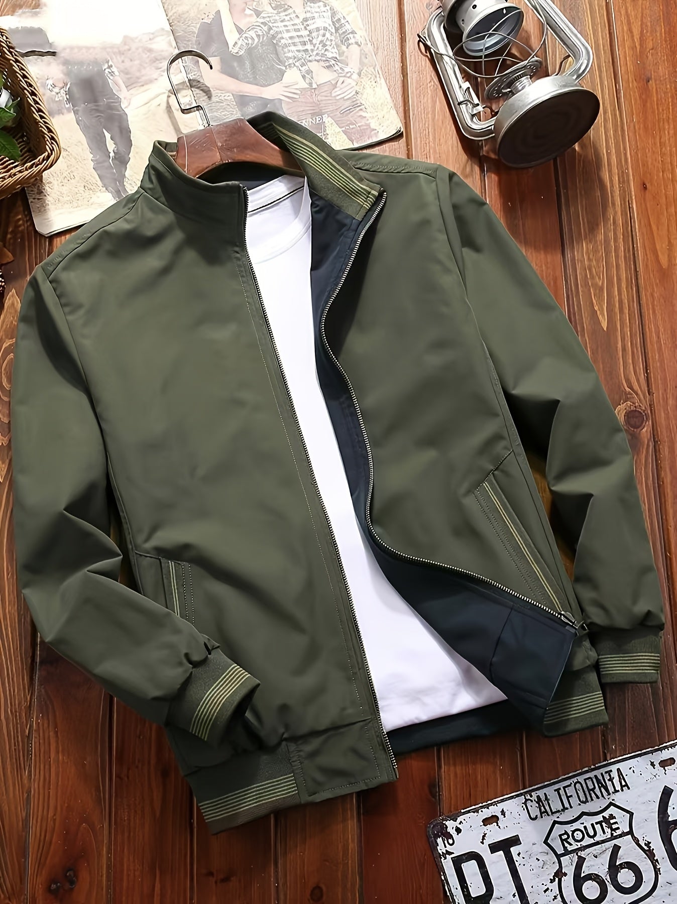 Men's olive green zip-up jacket with stand collar, dual-sided design and pockets. Machine washable and trendy for casual wear.