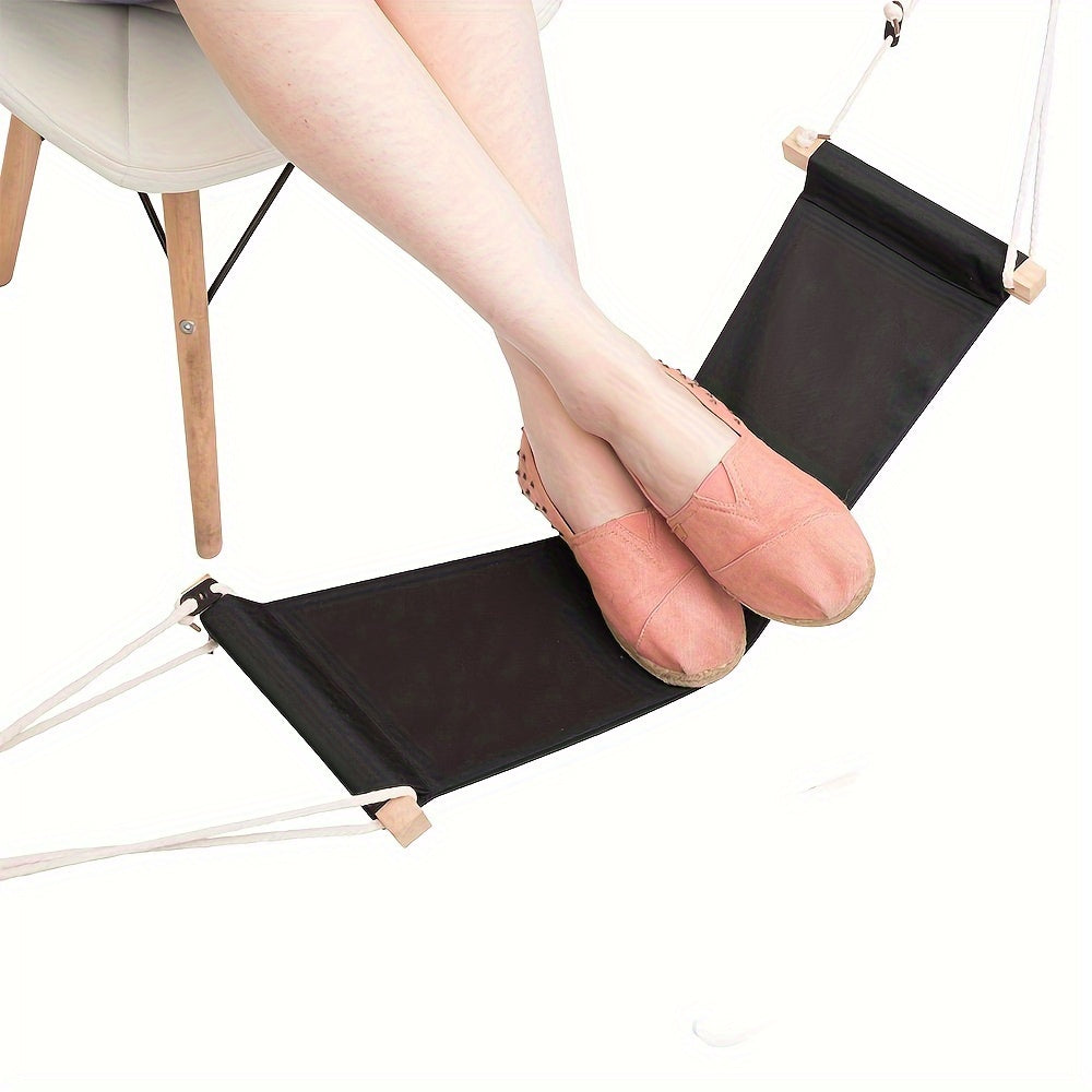 Portable under-desk footrest hammock made of linen in black and orange, adjustable for use in office, home, garden, and camping.