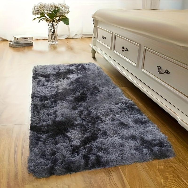 This plush rug in tie-dye style adds a modern and simple touch to any indoor space. It is soft, comfortable, fluffy, and easy to manage, creating a cozy atmosphere in your bedroom, living room, leisure area, entertainment area, or any other indoor space.