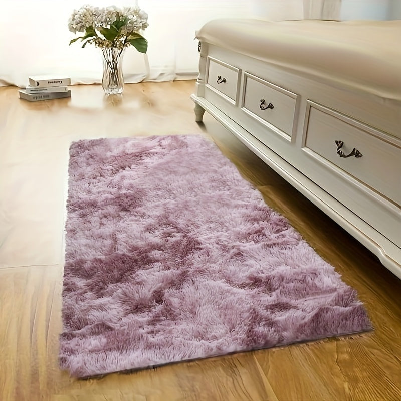 This plush rug in tie-dye style adds a modern and simple touch to any indoor space. It is soft, comfortable, fluffy, and easy to manage, creating a cozy atmosphere in your bedroom, living room, leisure area, entertainment area, or any other indoor space.