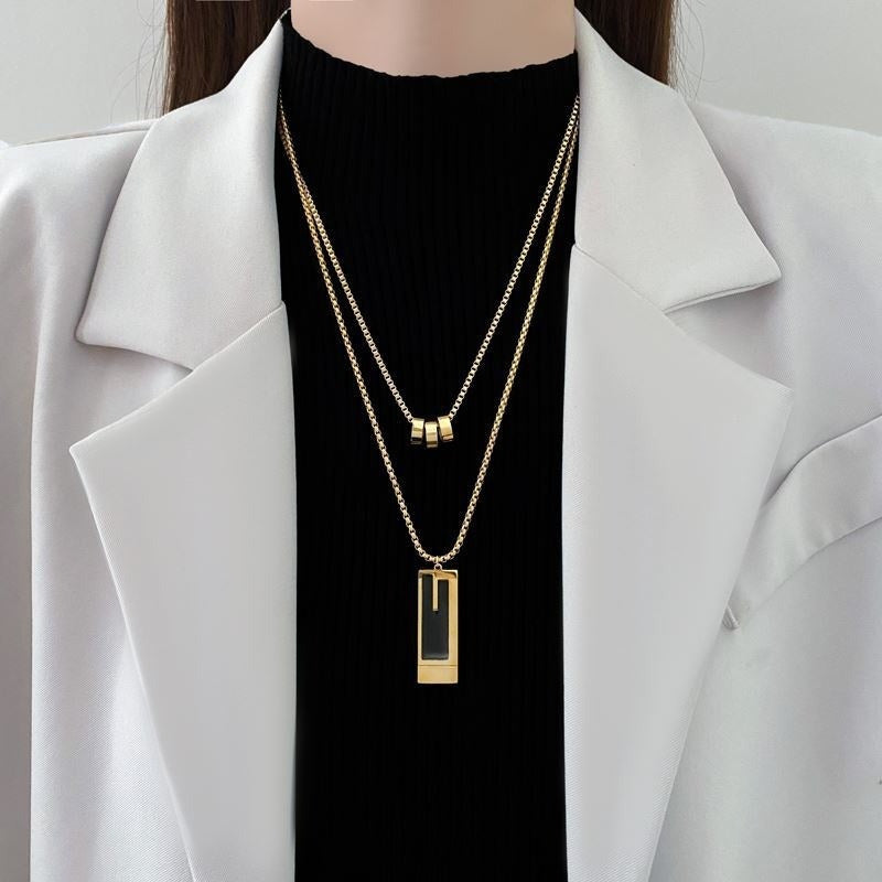 Stylish Titanium Steel Necklace with Double-layered Sweater Chain, Elevating Your Outfit with a Sophisticated Touch. versatile Pendant Accessory.