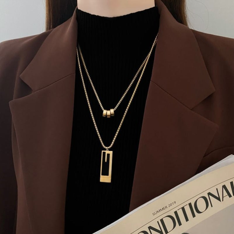 Stylish Titanium Steel Necklace with Double-layered Sweater Chain, Elevating Your Outfit with a Sophisticated Touch. versatile Pendant Accessory.