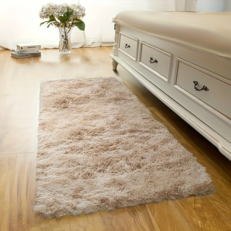 This plush rug in tie-dye style adds a modern and simple touch to any indoor space. It is soft, comfortable, fluffy, and easy to manage, creating a cozy atmosphere in your bedroom, living room, leisure area, entertainment area, or any other indoor space.