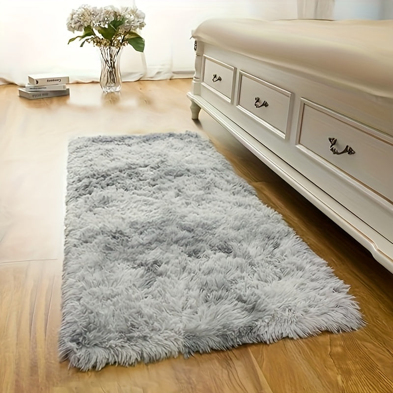 This plush rug in tie-dye style adds a modern and simple touch to any indoor space. It is soft, comfortable, fluffy, and easy to manage, creating a cozy atmosphere in your bedroom, living room, leisure area, entertainment area, or any other indoor space.