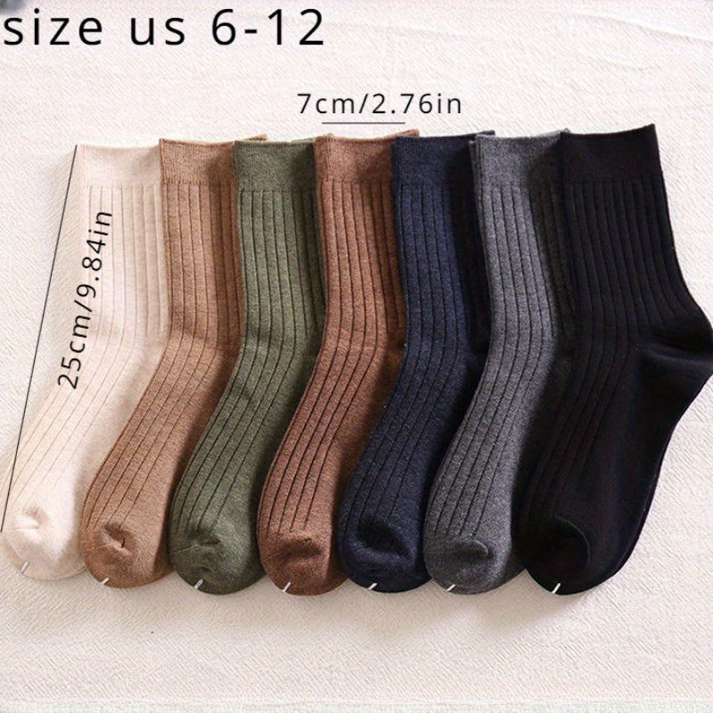 5 pairs of men's trendy solid crew socks, suitable for outdoor wear in all seasons.