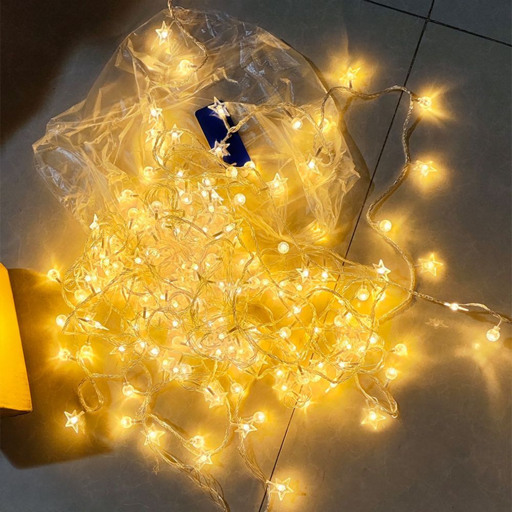 Battery operated Majisu Warm White LED Star Bubble Ball String Lights, ideal for parties, weddings, and holiday decorations.