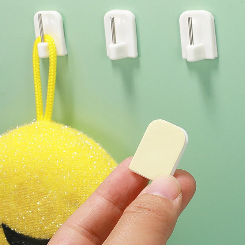 10 strong adhesive hooks for versatile wall mounting, made of durable plastic and steel. Easy to install for curtain rods, key holders, and towel racks.