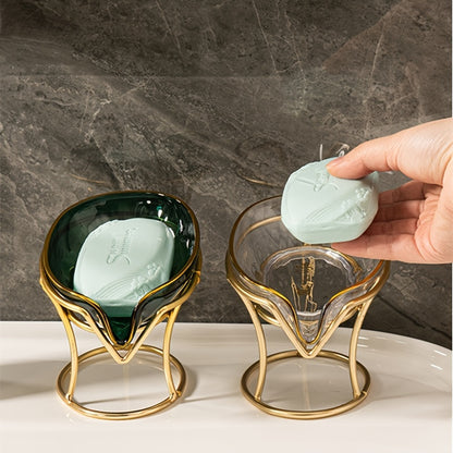 Elegant golden-tone soap dish with drainage, no-drill plastic holder in stylish green and clear design for bathroom and kitchen.