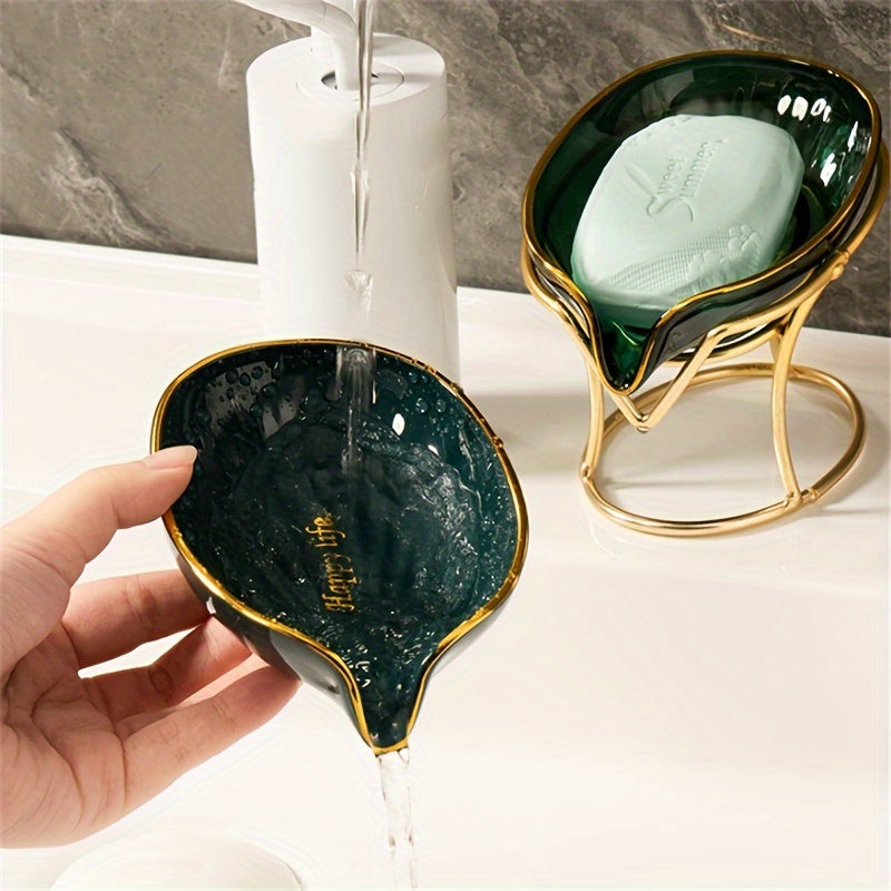 Elegant golden-tone soap dish with drainage, no-drill plastic holder in stylish green and clear design for bathroom and kitchen.