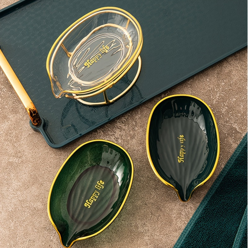 Elegant golden-tone soap dish with drainage, no-drill plastic holder in stylish green and clear design for bathroom and kitchen.