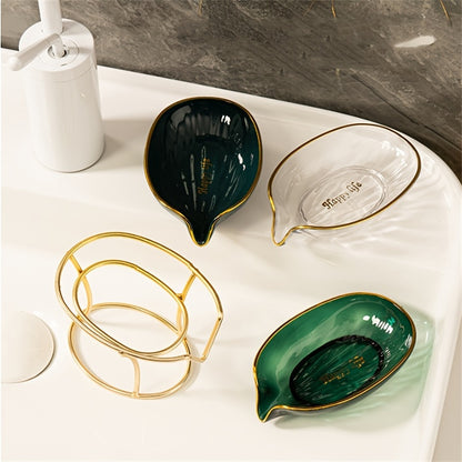 Elegant golden-tone soap dish with drainage, no-drill plastic holder in stylish green and clear design for bathroom and kitchen.