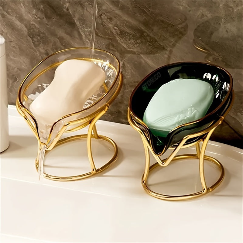 Elegant golden-tone soap dish with drainage, no-drill plastic holder in stylish green and clear design for bathroom and kitchen.