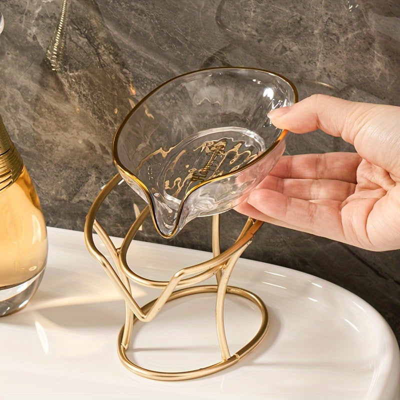 Elegant golden-tone soap dish with drainage, no-drill plastic holder in stylish green and clear design for bathroom and kitchen.