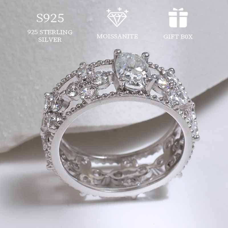 This ring is made of 925 sterling silver and features a 1ct or 2ct goose egg moissanite in a hypoallergenic hollow three-dimensional four-leaf clover design. It comes with a moissanite certificate and is packaged in an exquisite gift box for women.