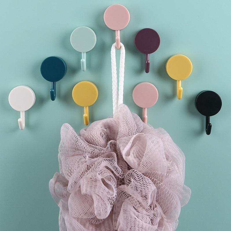 10 colorful self-adhesive hooks for easy organization in any room without drilling.