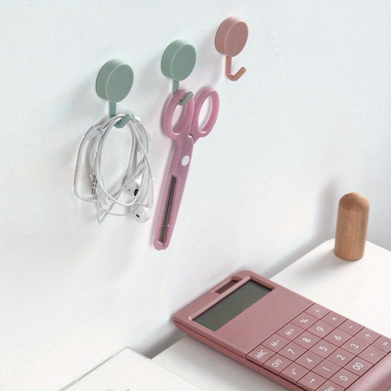 10 colorful self-adhesive hooks for easy organization in any room without drilling.