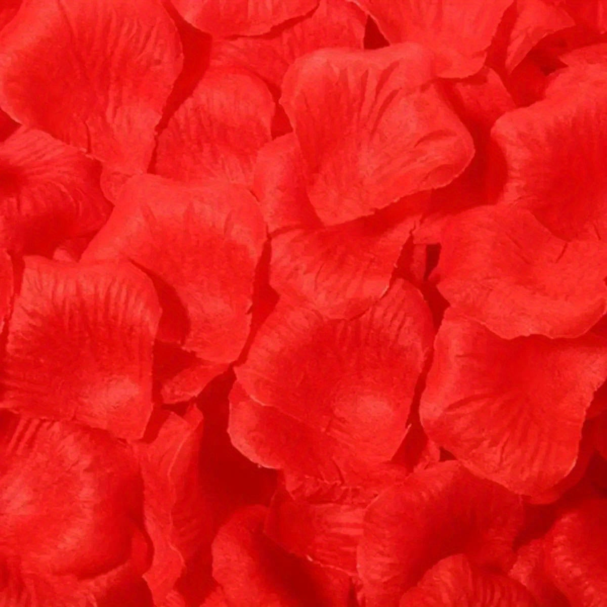 1000 fake red rose petals for romantic wedding and Valentine's Day décor.