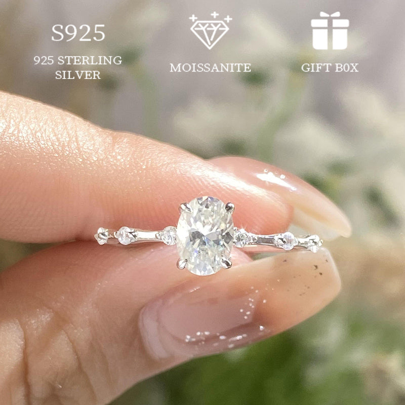 Elegant Hypoallergenic 925 Sterling Silver Moissanite Ring with Goose Egg Shape, 1-2ct Premium Sense for Women. Perfect for Proposal, Engagement, Wedding, or as a Valentine's Day Gift. Comes with Moissanite Certificate and Beautiful Gift Box Packaging.