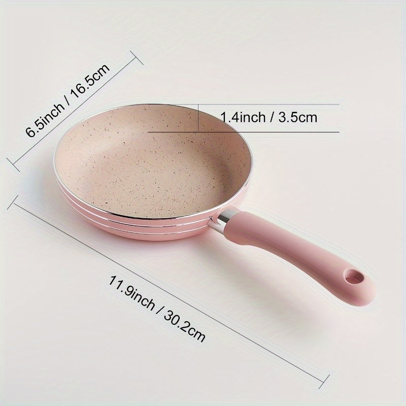 This Pink Maifan Stone Non-Stick Skillet measures 16.51cm and is ideal for making soups and frying. Made of durable aluminum, this cookware must be hand washed for best results.