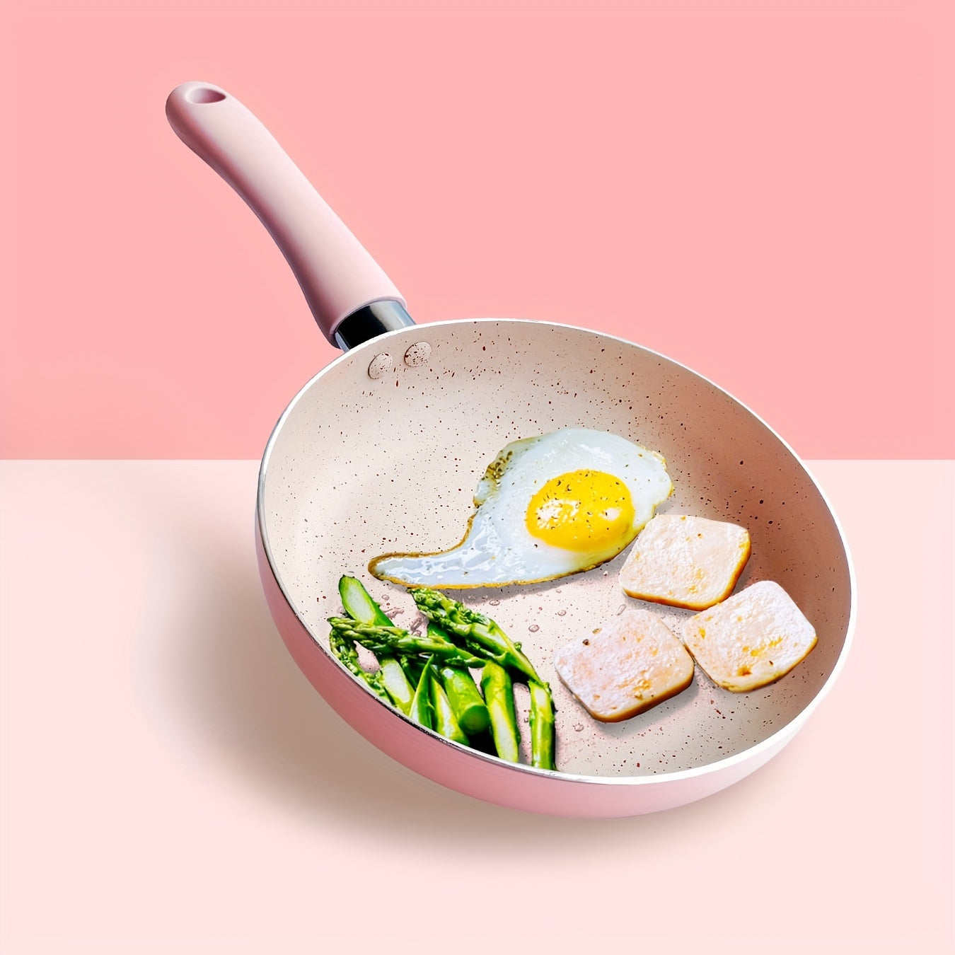 This Pink Maifan Stone Non-Stick Skillet measures 16.51cm and is ideal for making soups and frying. Made of durable aluminum, this cookware must be hand washed for best results.