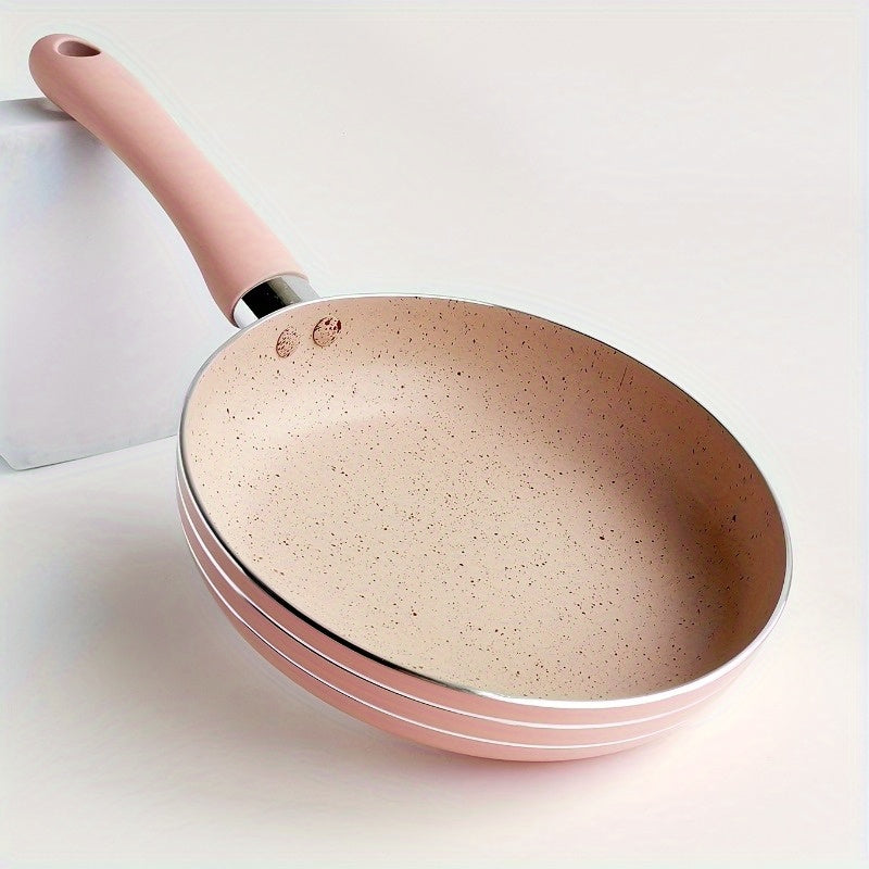 This Pink Maifan Stone Non-Stick Skillet measures 16.51cm and is ideal for making soups and frying. Made of durable aluminum, this cookware must be hand washed for best results.