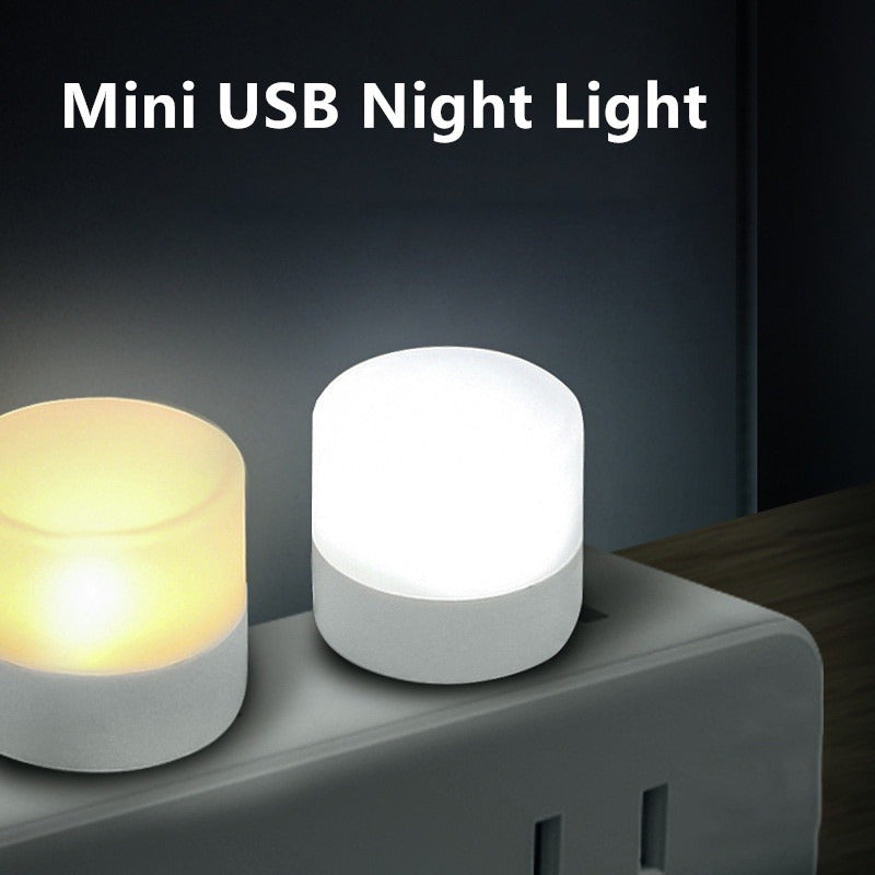 10 Mini USB Night Lights emitting warm white light for eye protection while reading, with USB plug for charging from computer or mobile power source.